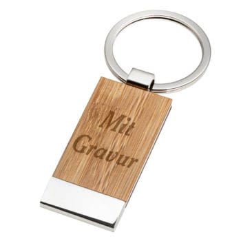 Rechteckiger Schlüsselanhänger aus Holz und Metall mit eingraviertem "Mit Gravur" auf dem Holz.