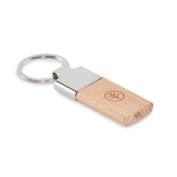 Schlüsselanhänger "LLAVING" mit Metall und Holz, graviertem Blattsymbol und Personalisierung.