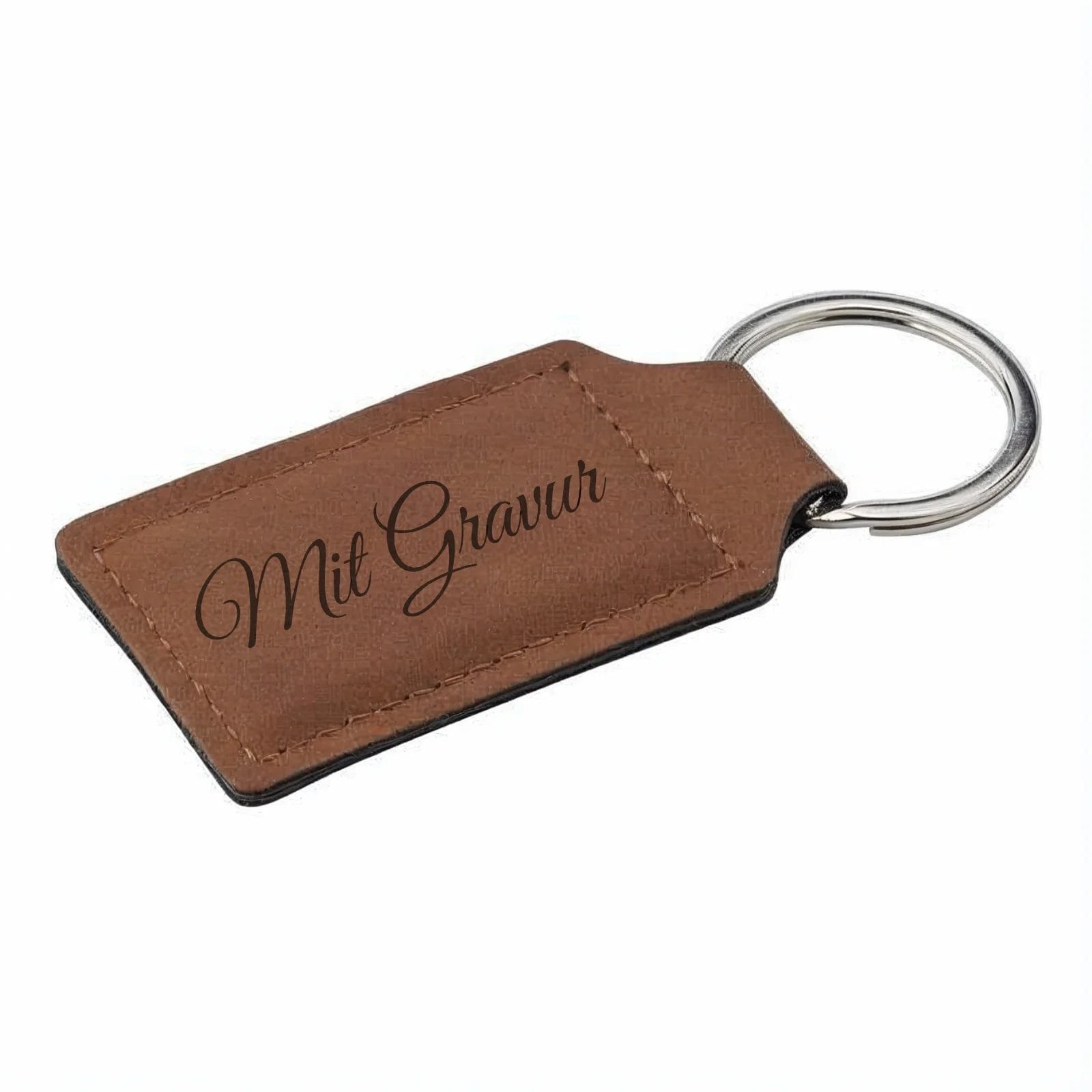 Schlüsselanhänger aus braunem Leder mit der Gravur "Mit Gravur", befestigt an einem silbernen Metallschlüsselring.